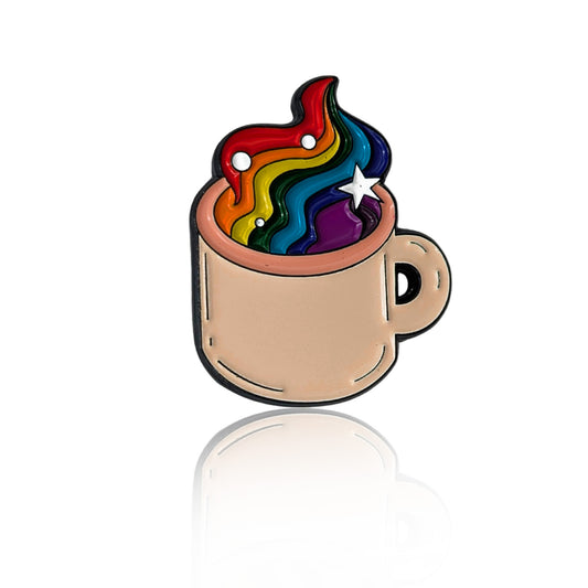 Enamel pin of a beige coffee mug with rainbow-colored steam and white stars