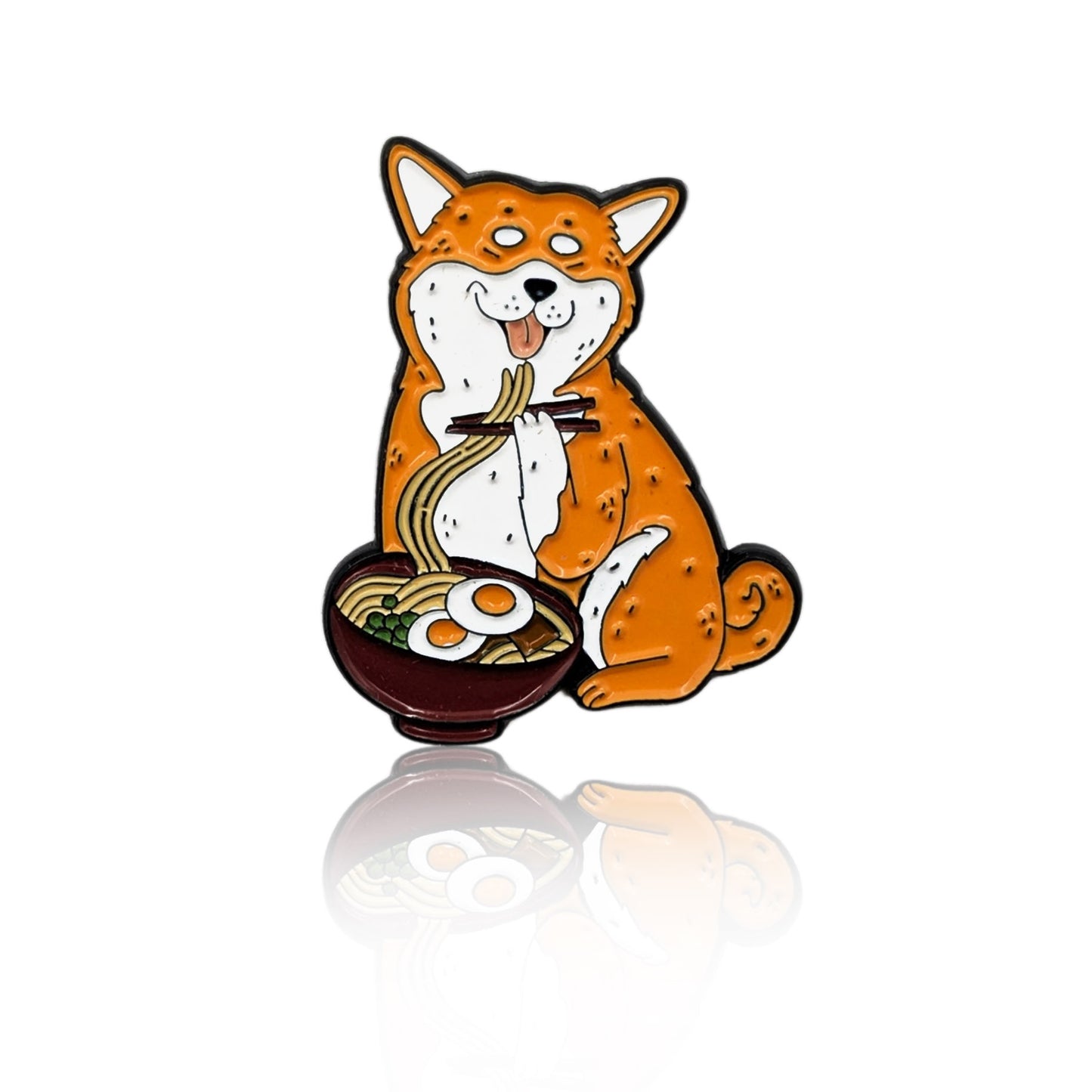 Enamel pin of a cartoon Shiba Inu eating ramen with chopsticks and a full bowl