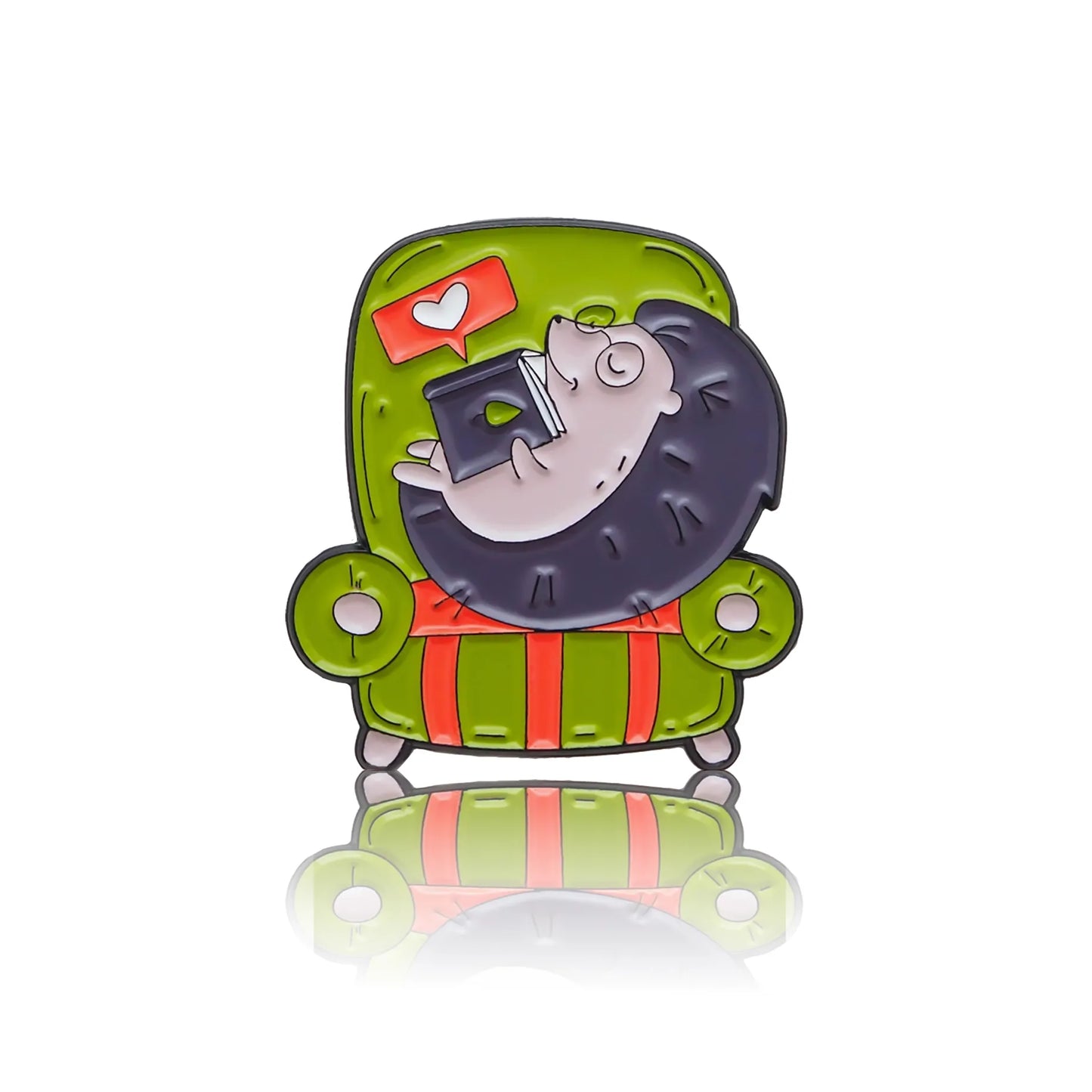 A hedgehog reading a book in a green and red armchair