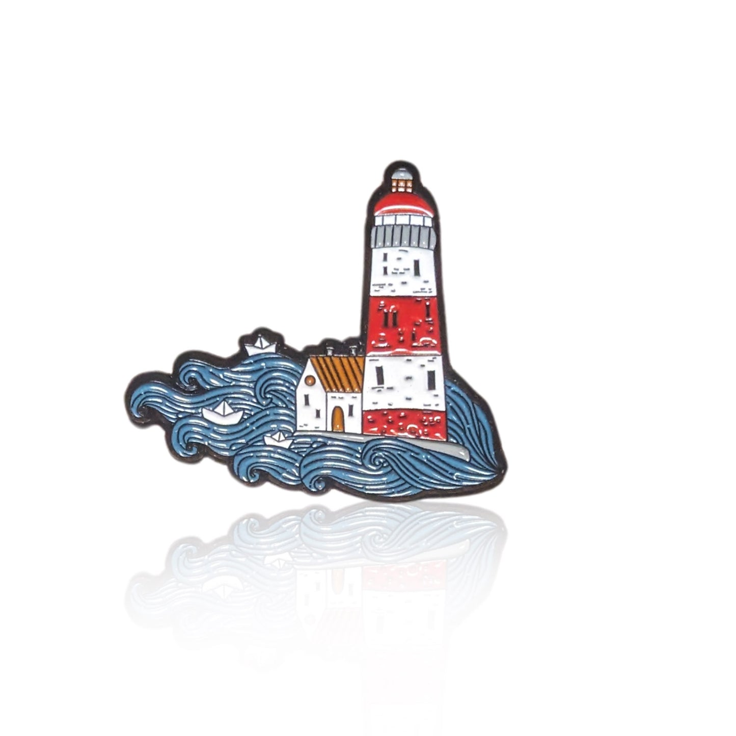 Lighthouse in he ocean enamel pin
