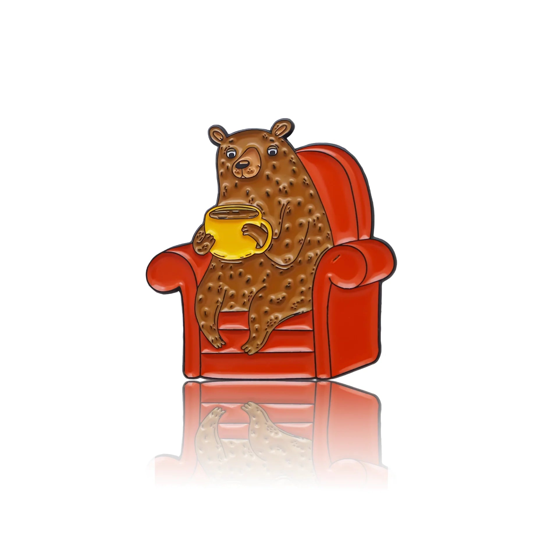 Bear sitting in an armchair with a cup of coffee enamel pin