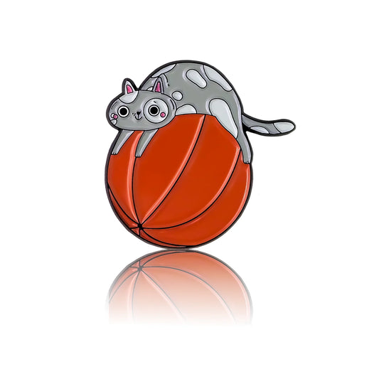 Grey cat with a ball 