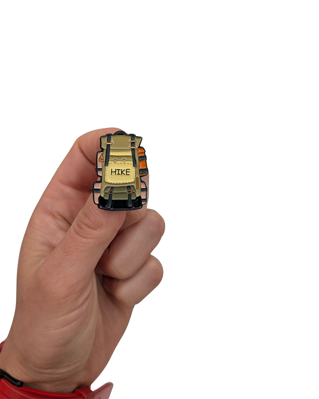 Hiking backpack enamel pin 32mm shown in hand for size by PINBOX
