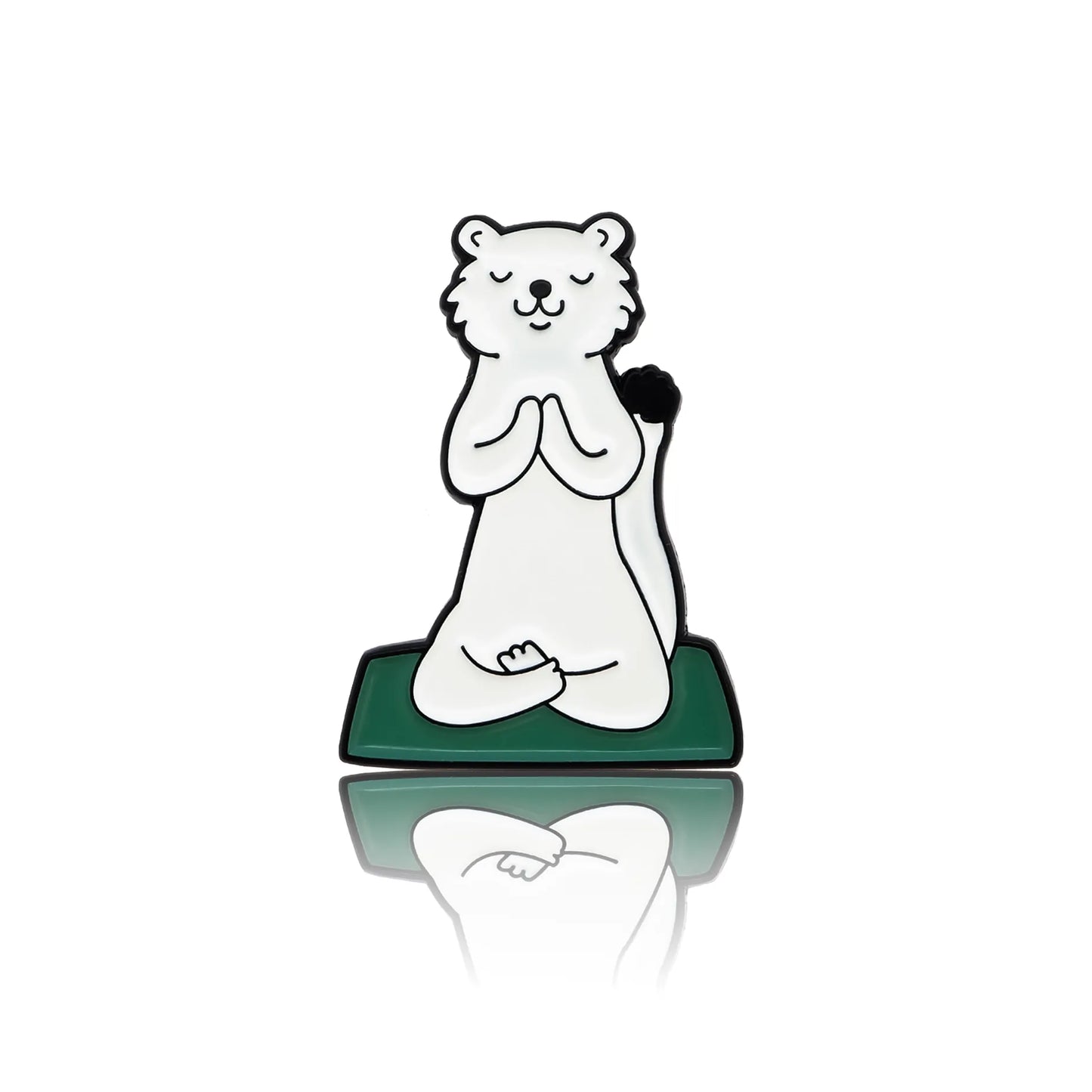 White ferret practicing yoga on a green mat