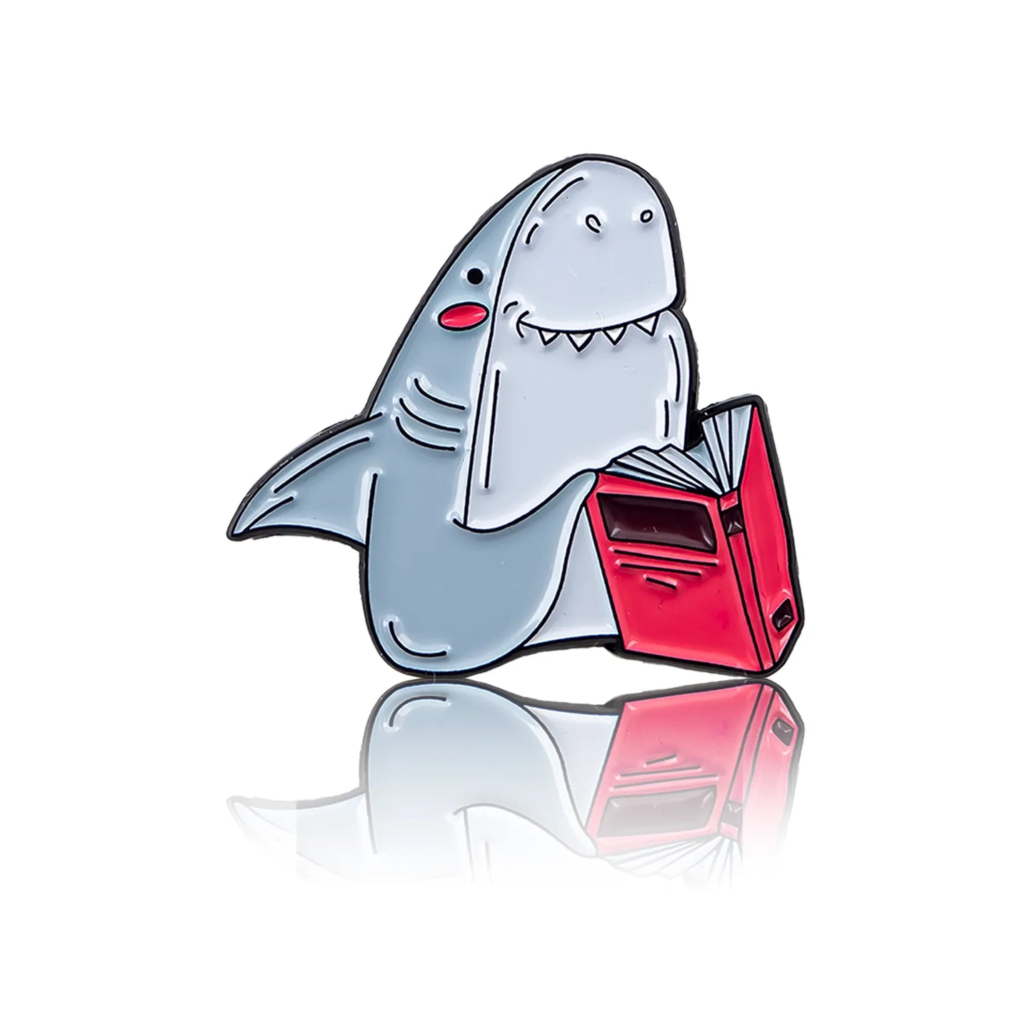 Smiling shark reading a pink book