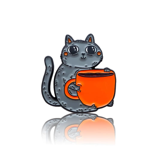 The kitten holding a cup of coffee