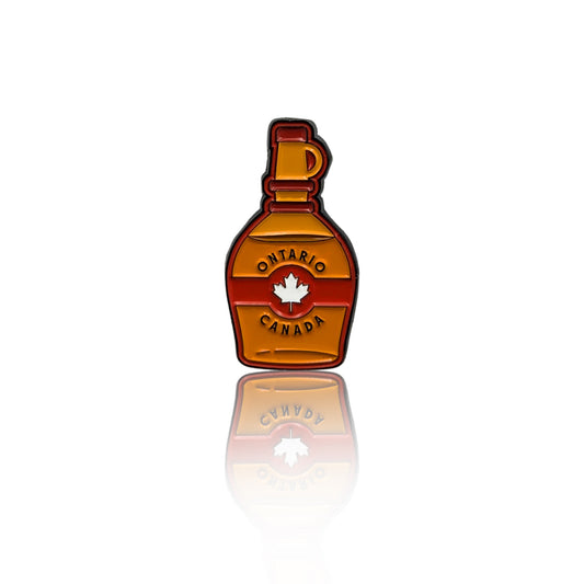 Maple syrup bottle enamel pin with Ontario, Canada text and maple leaf, shown on a clean white background