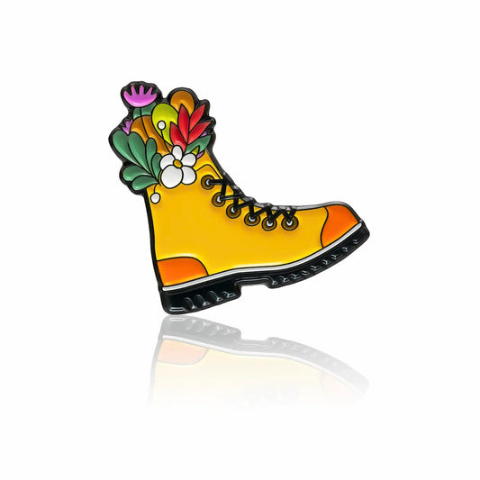 Yellow hiking boot enamel pin with colorful flowers inside, 32mm by PINBOX