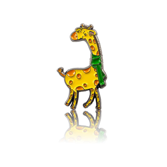 smiling giraffe in a green scarf